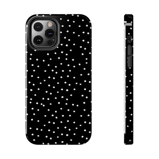 Black phone case with white polka dots, camera cutout, and side button openings.
