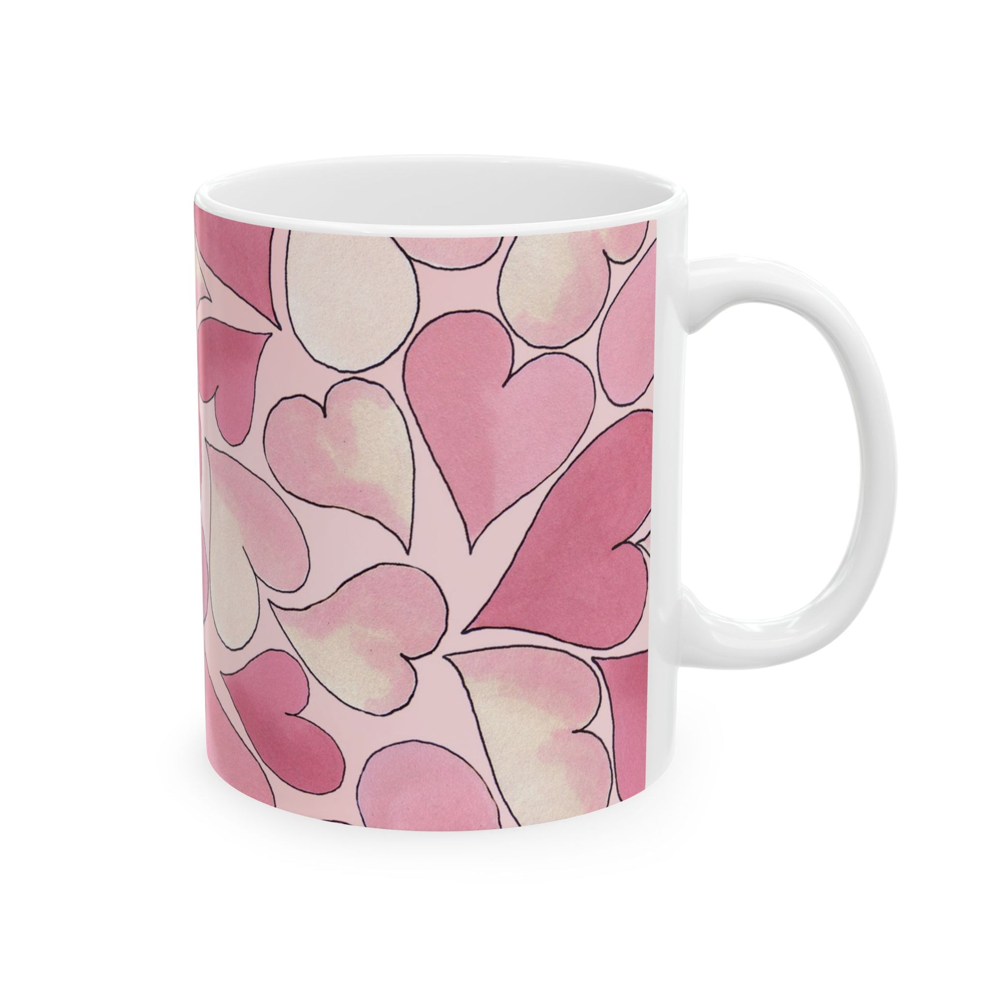 White mug with a pink heart pattern, featuring varying shades and black outlines.