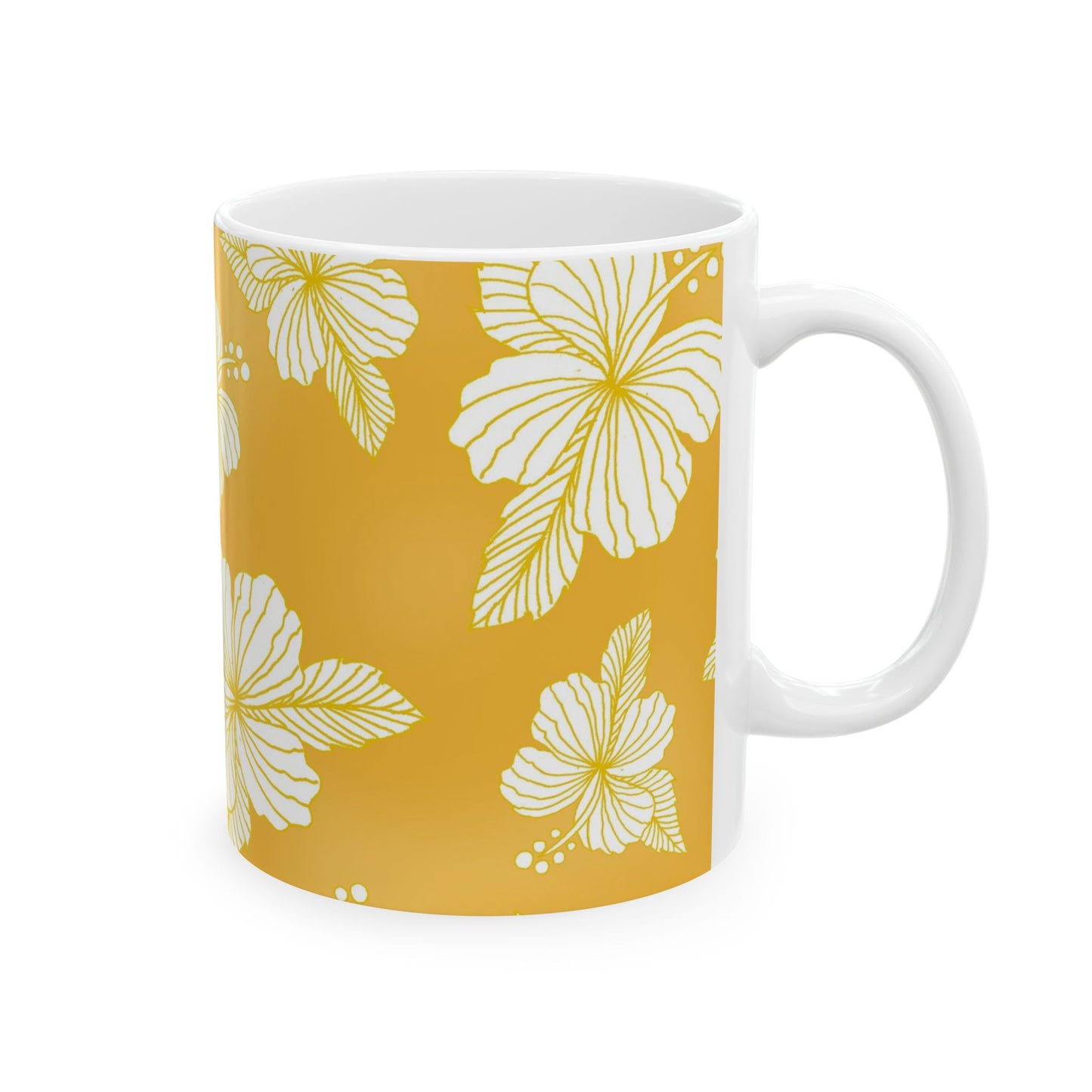 White mug with yellow floral pattern featuring large, detailed hibiscus flowers.