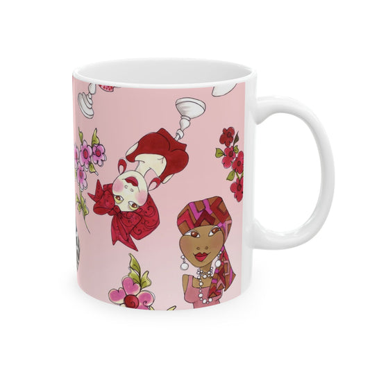 Pink mug with stylized characters, red and purple floral accents, and playful cartoon designs.