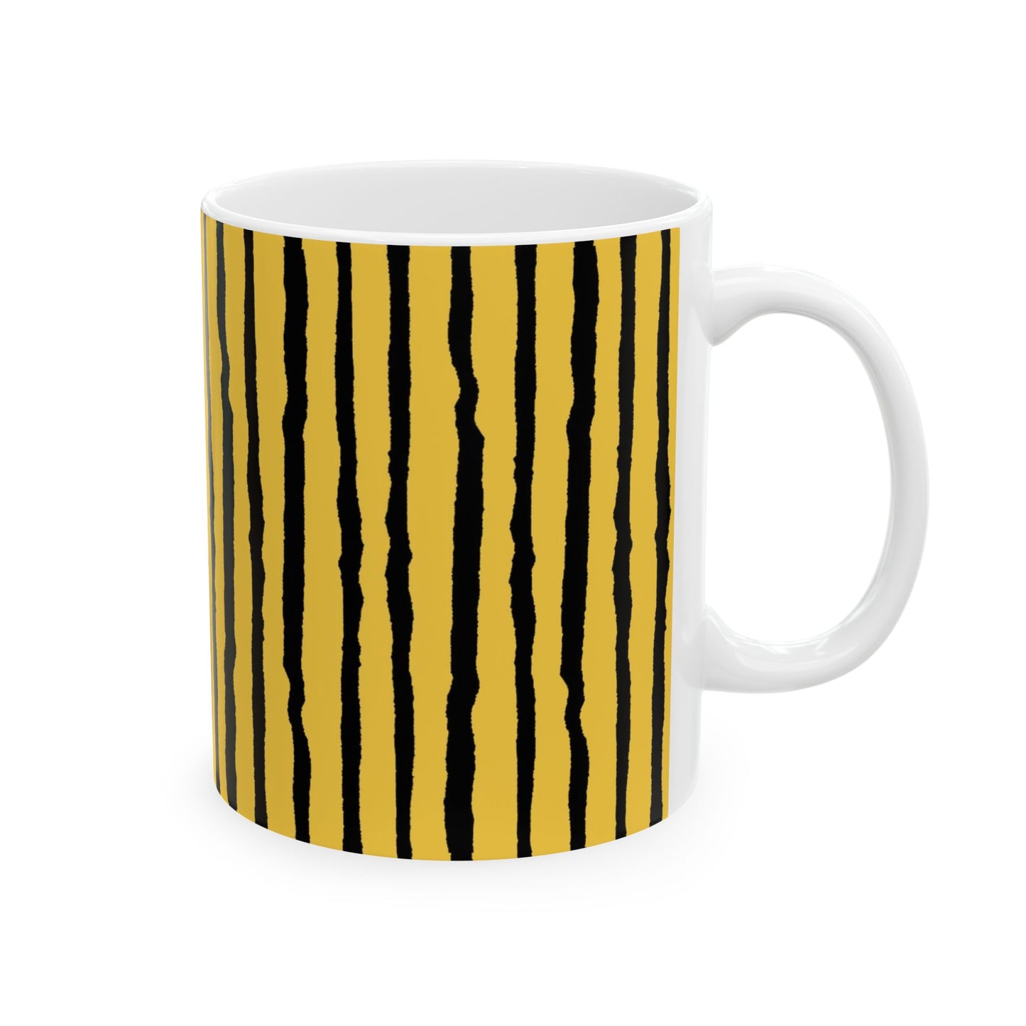 White mug with vertical black stripes on a yellow background.