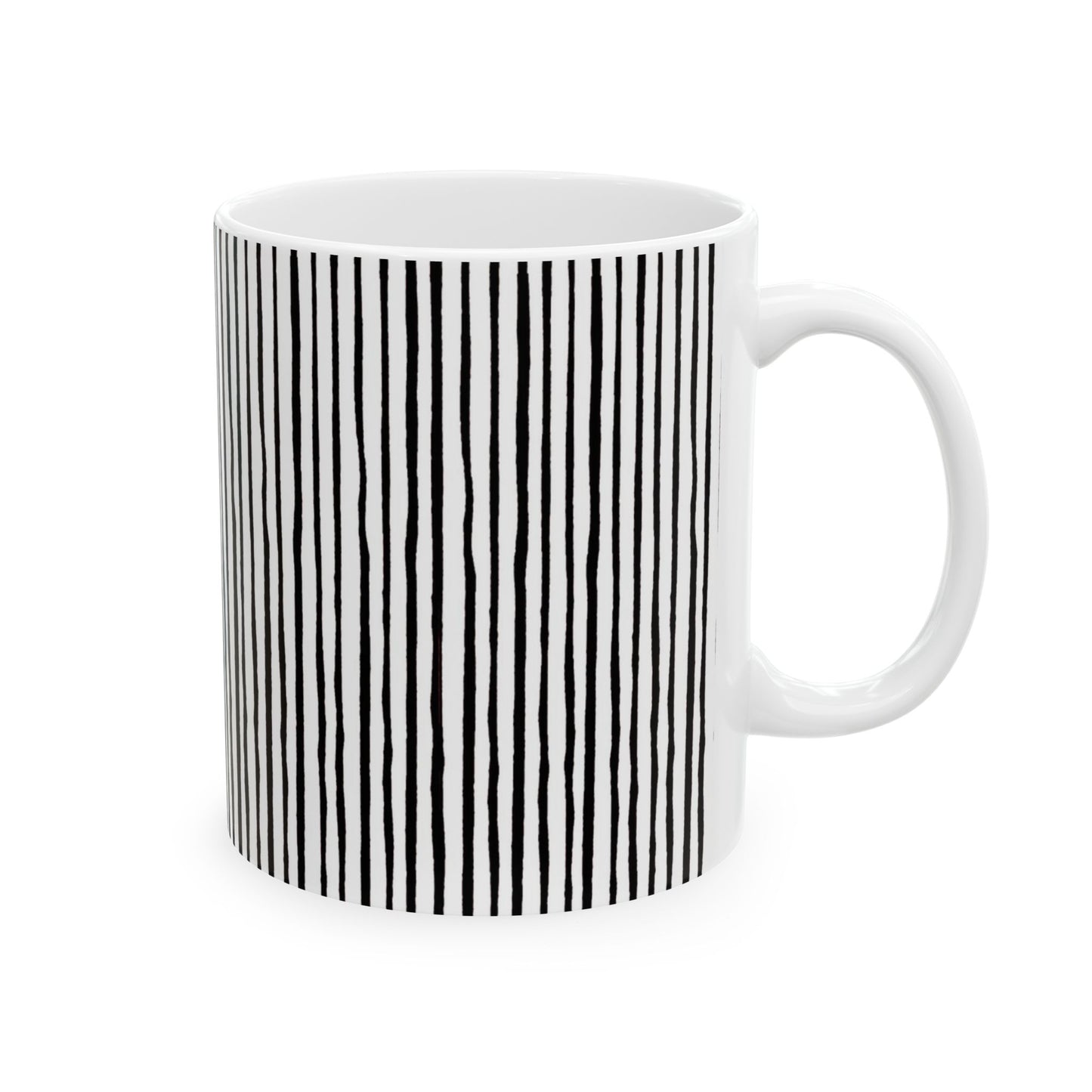 White mug with vertical black wavy lines, creating a striped pattern on the side.