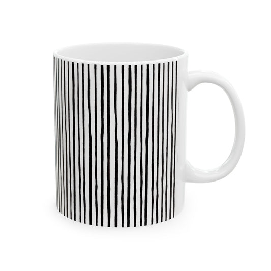 White mug with vertical black wavy lines, creating a striped pattern on the side.