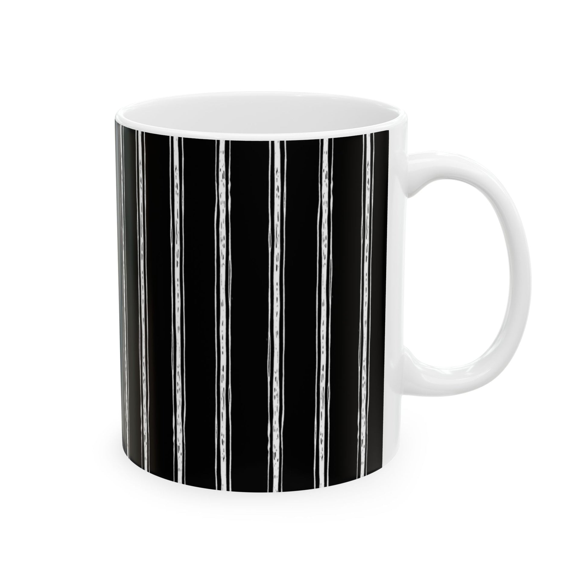 White mug with vertical black and white stripes, plain white interior and handle.