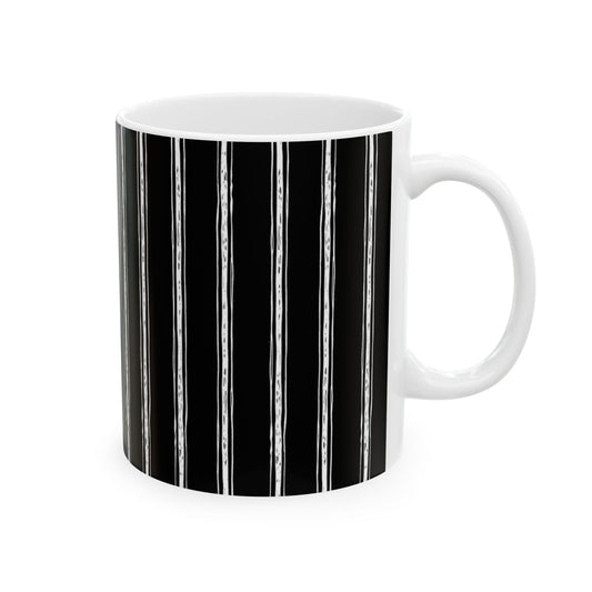 White mug with vertical black and white stripes, plain white interior and handle.