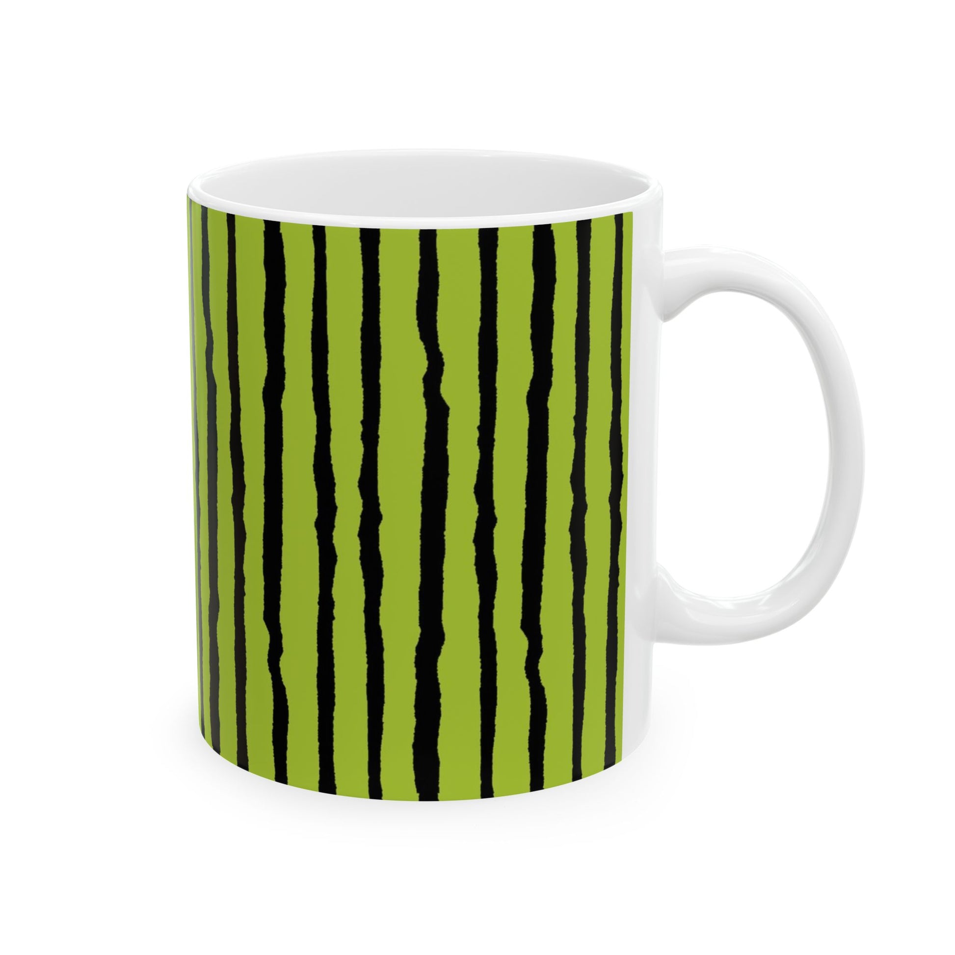 White mug with green and black vertical stripe pattern.