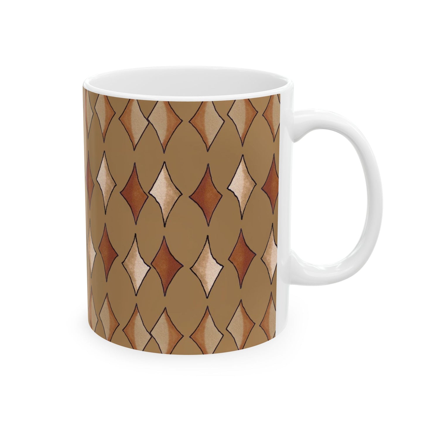 White mug with a brown diamond pattern in shades of beige and rust on a tan background.
