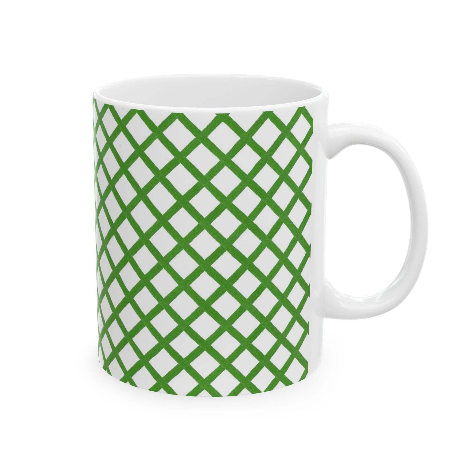 White mug with a green crisscross lattice pattern, featuring a smooth handle on the right side.