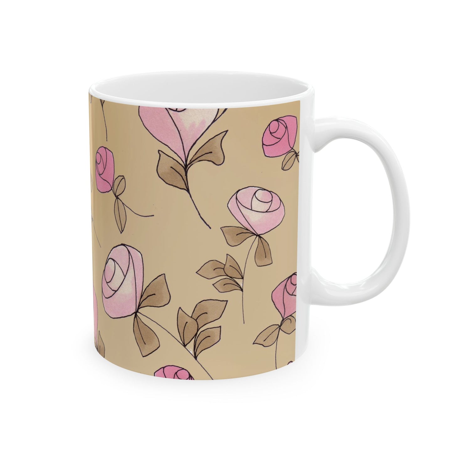 White mug with pink floral pattern and green leaves on a beige background.