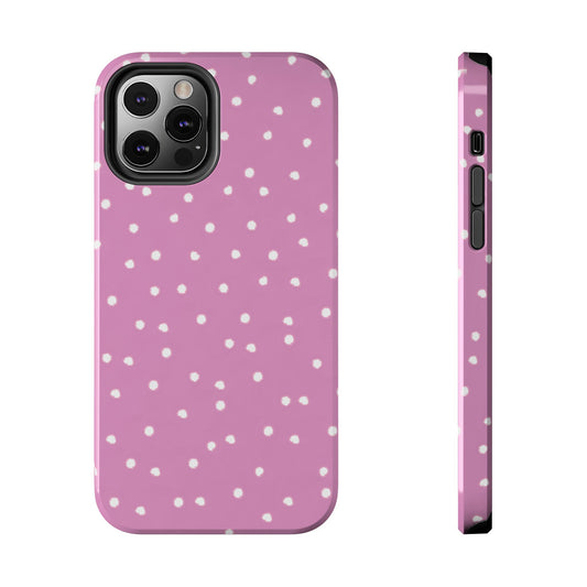 Pink phone case with white polka dots, showing back and side views.