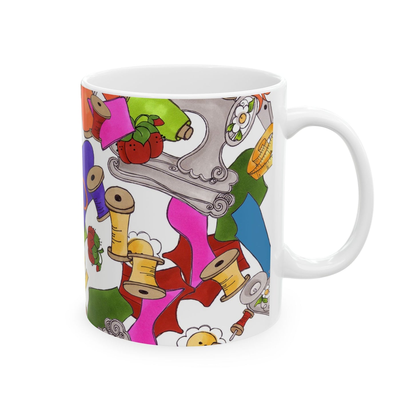 White mug with colorful sewing-themed patterns, including spools, buttons, and fabric.