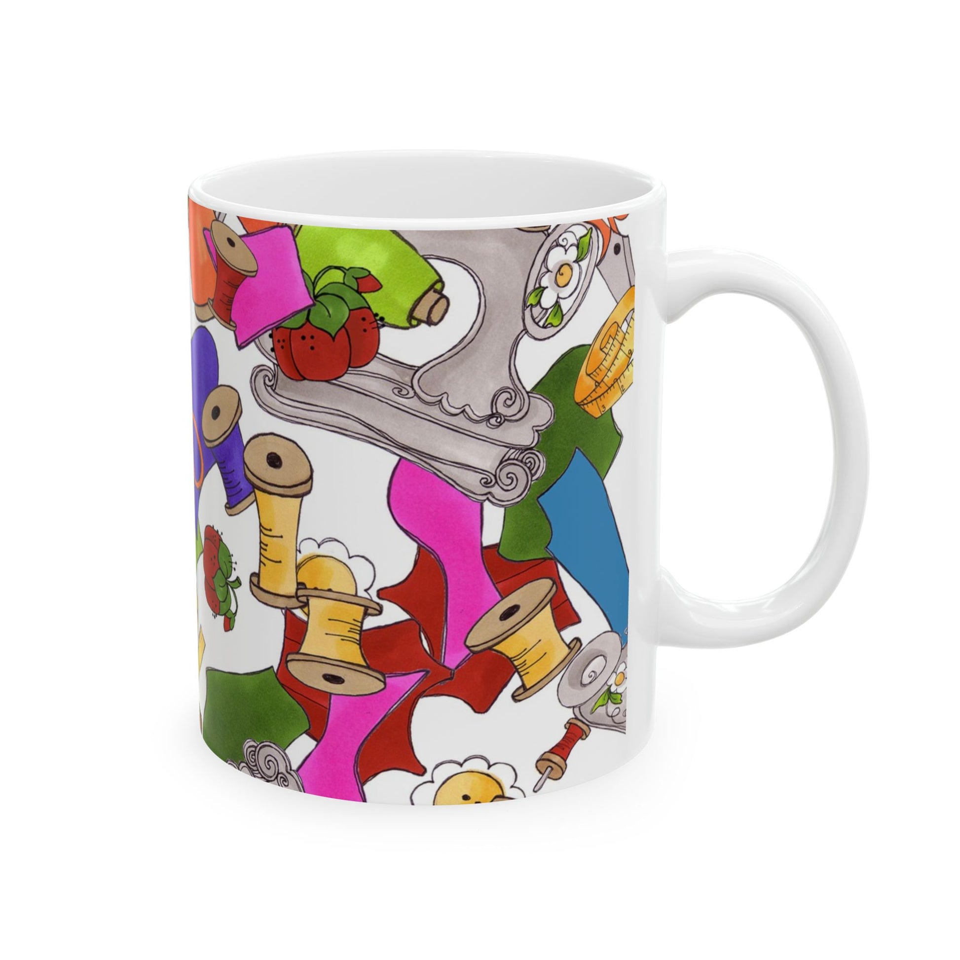 White mug with colorful sewing-themed patterns, including spools, buttons, and fabric.