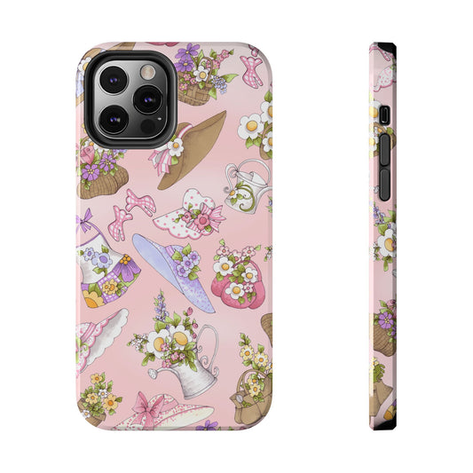 Pink phone case with floral patterns, hats, purses, and watering cans filled with flowers.