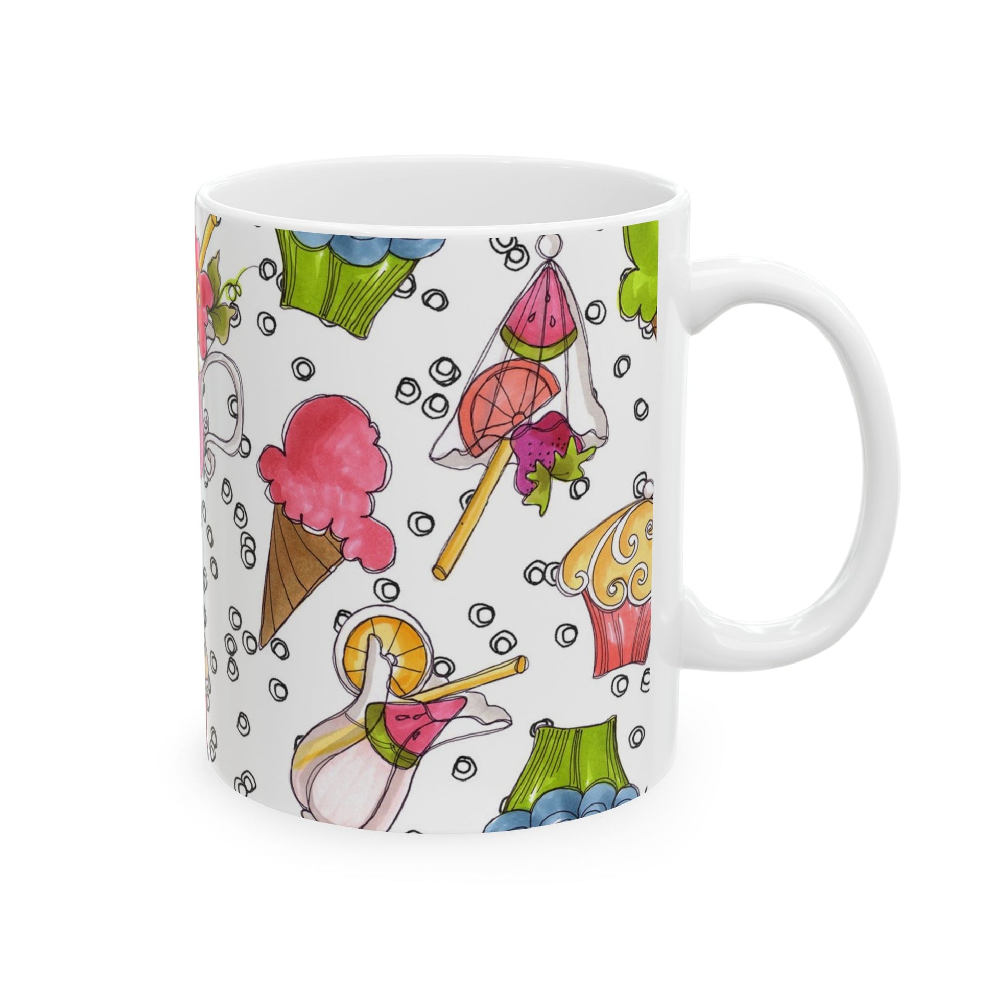 White mug with colorful desserts and fruits: ice cream, cupcakes, and lollipops on it.