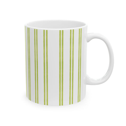 White mug with vertical green stripes and a handle on the right side.