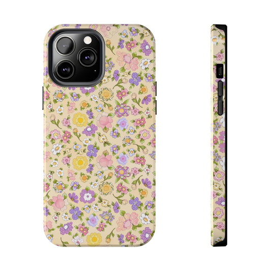 Floral phone case with pastel pink, yellow, and purple flowers on a beige background.