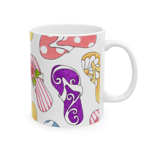White mug with colorful flip-flop designs in pink, purple, yellow, and striped patterns.