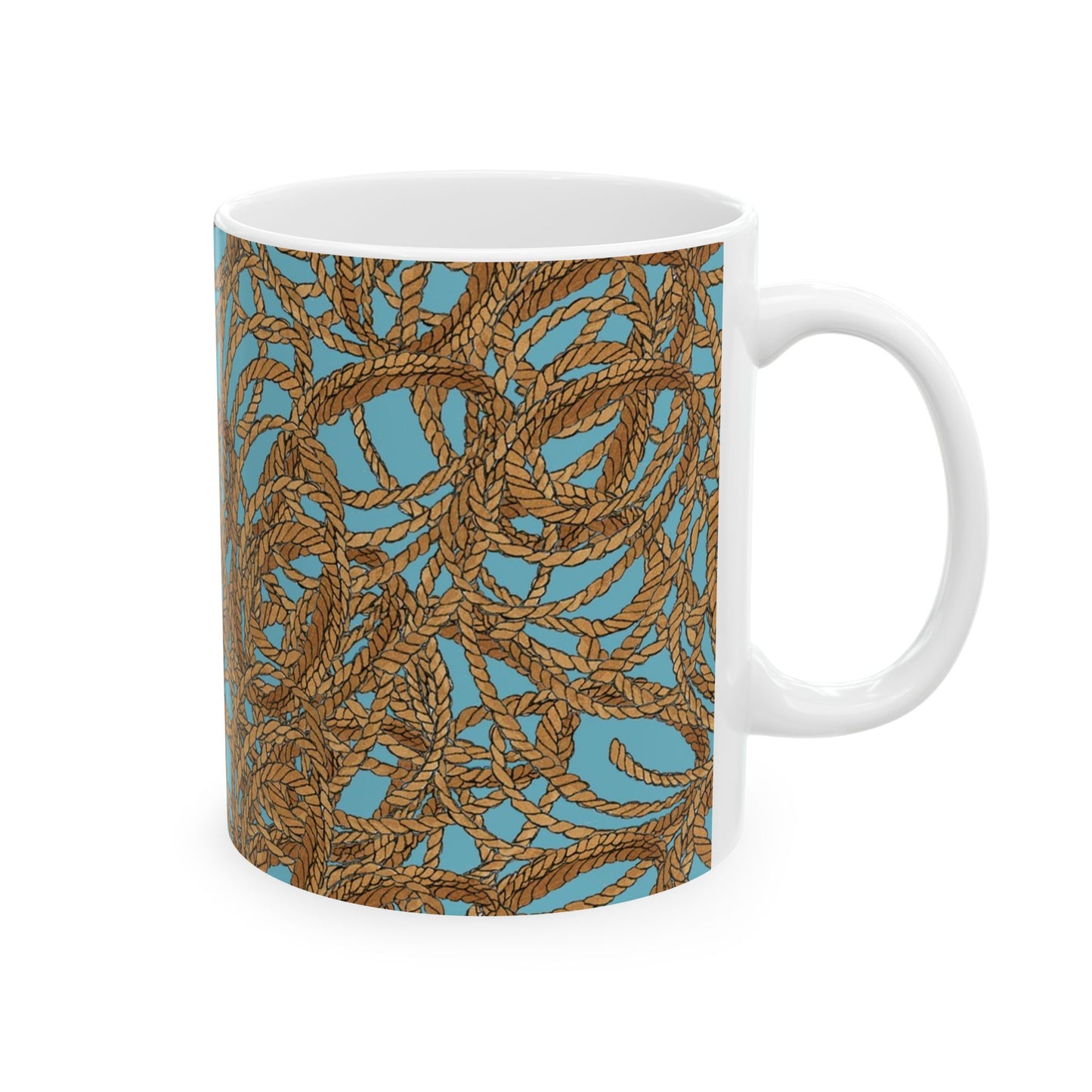 White mug with a blue background and intricate brown rope pattern wrapping around it.