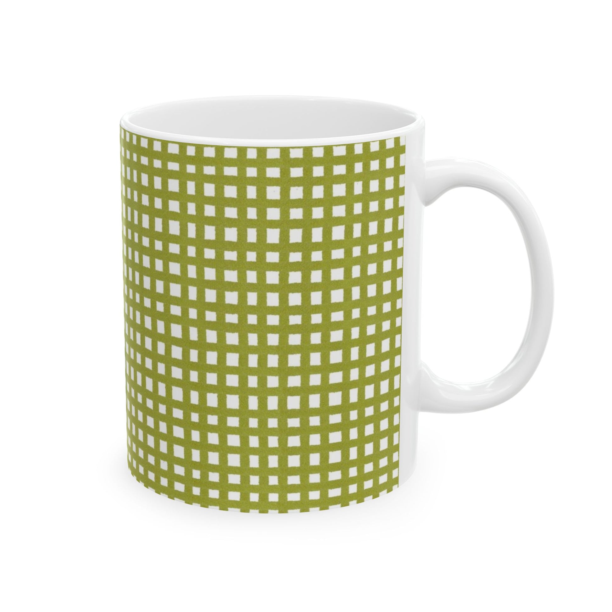 White mug with a green checkered pattern, featuring small white squares on a green background.
