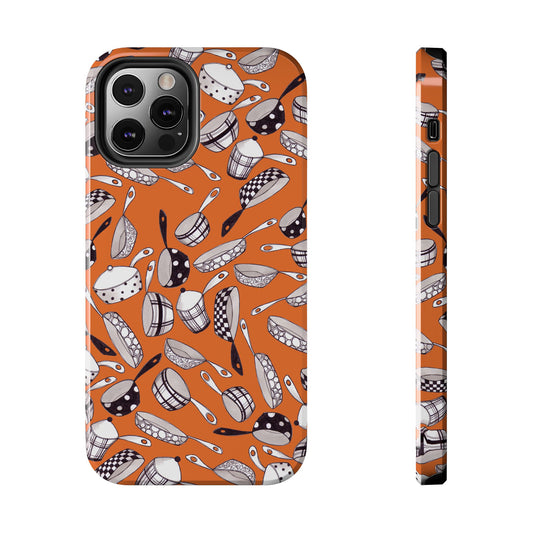 Orange phone case with black and white kitchen utensil pattern, featuring pans and ladles.