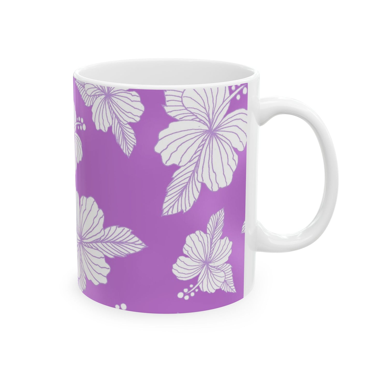 White mug with purple background and white hibiscus flower pattern.