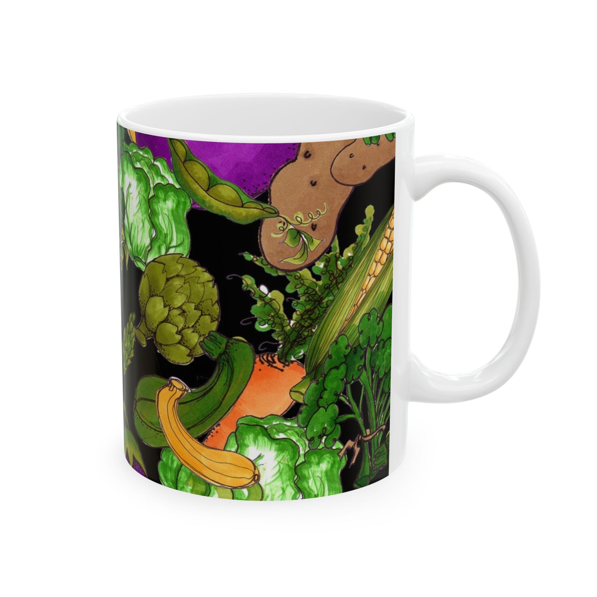 White mug with colorful vegetable illustrations, including corn, zucchini, and lettuce on black.