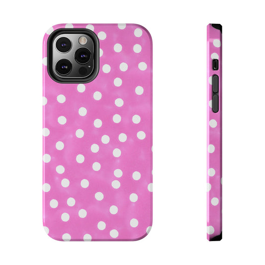 Pink phone case with white polka dots and camera cutout, shown from front and side.
