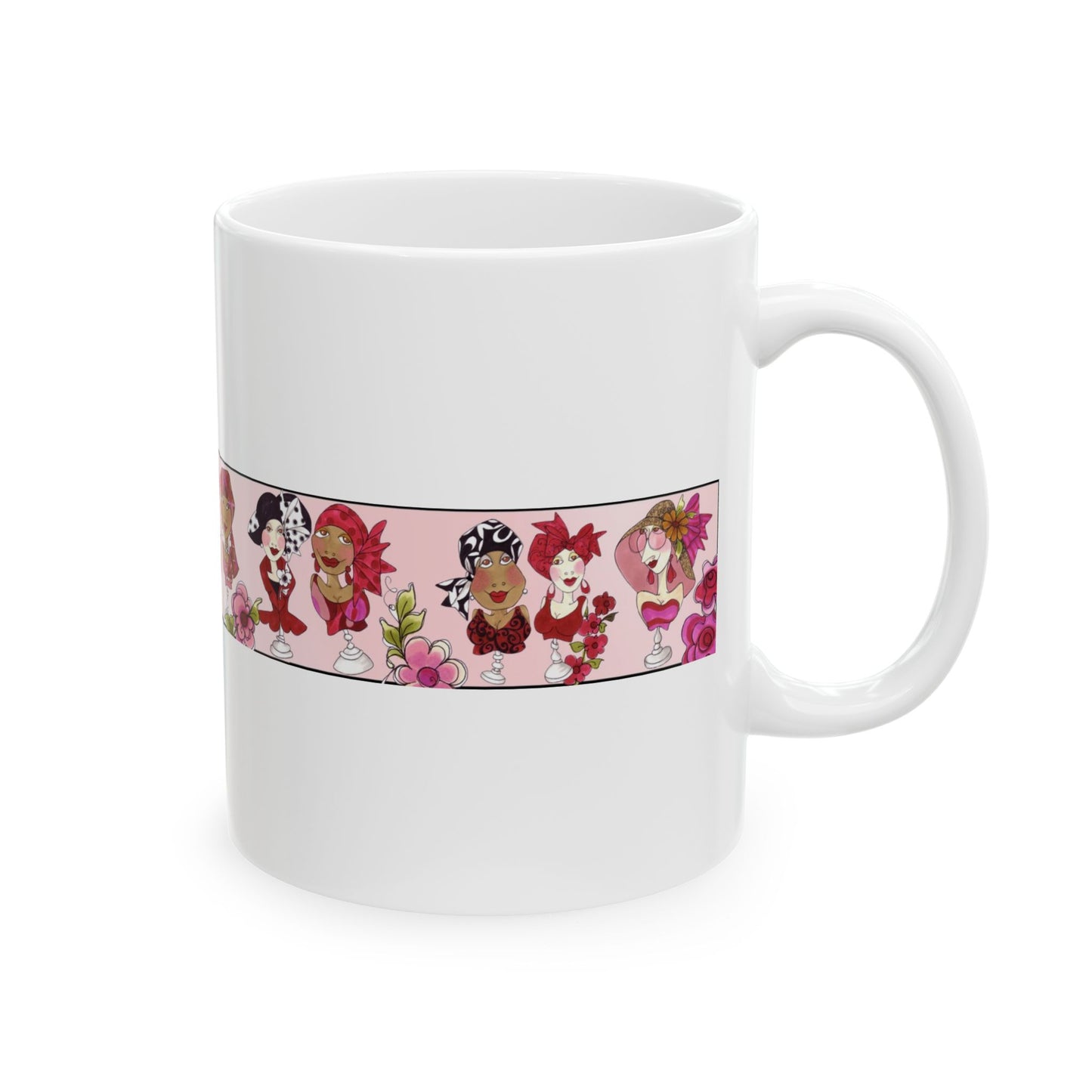 White mug with a pink band depicting diverse cartoon faces and colorful flowers.