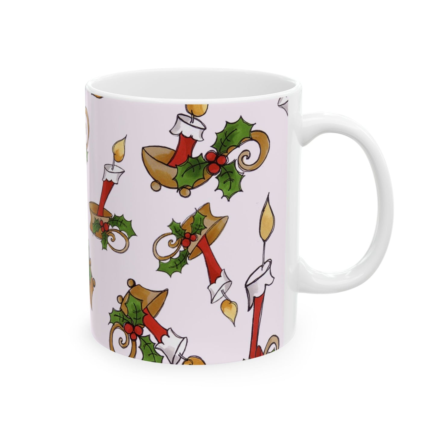 White mug with red candles, green holly leaves, and gold bells on a light pink background.