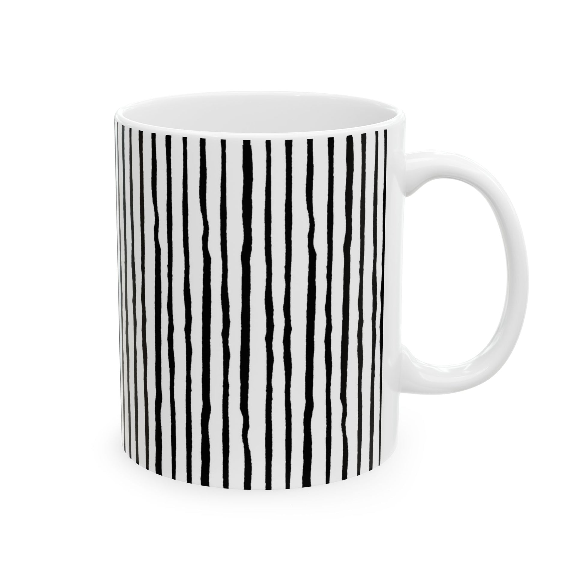 White mug with vertical black wavy stripes, featuring a simple, modern design.