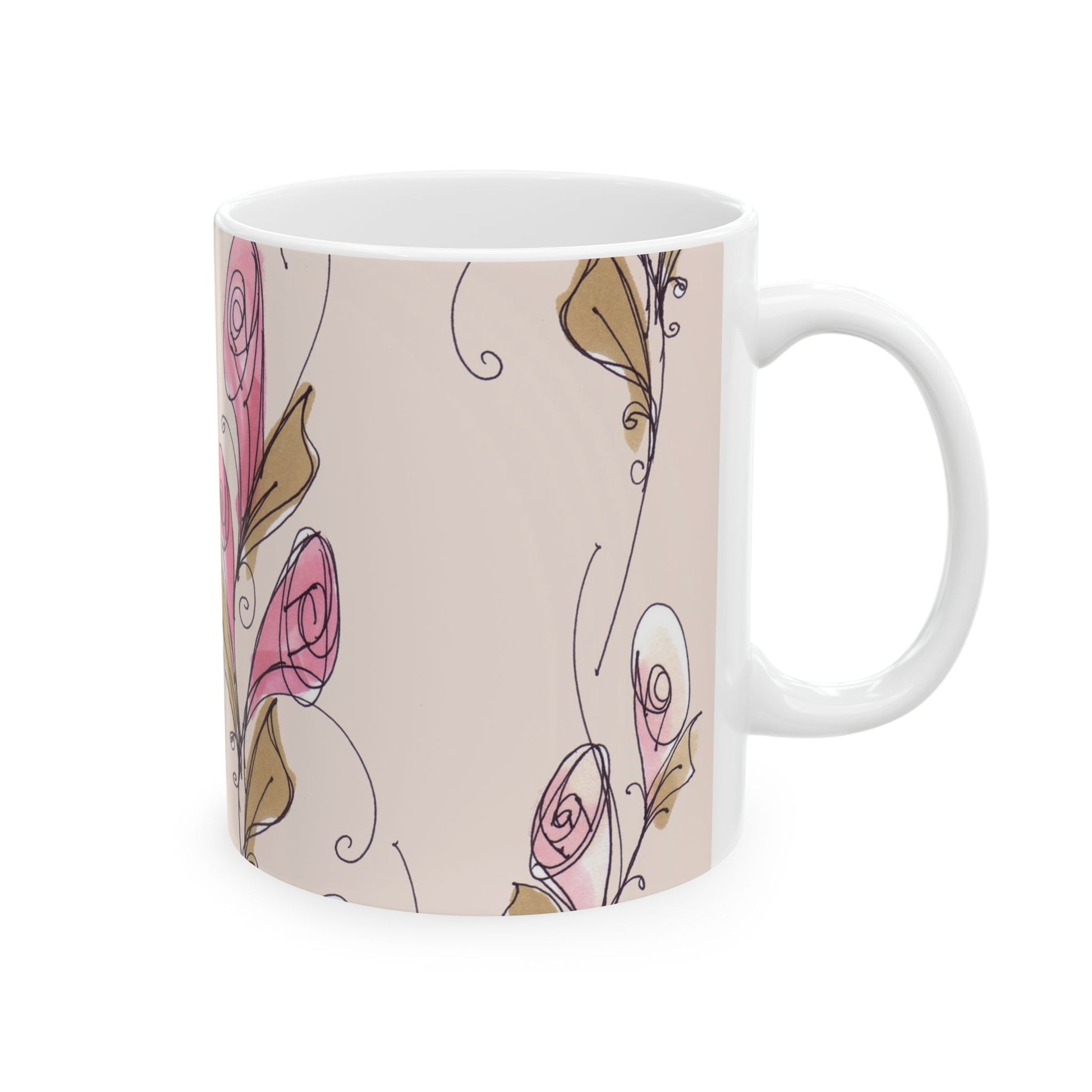 White mug with pink floral sketch and brown leaves on a beige background.