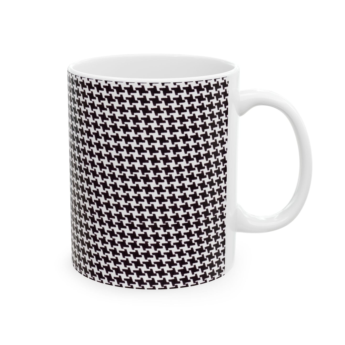 White mug with black houndstooth pattern covering the surface.