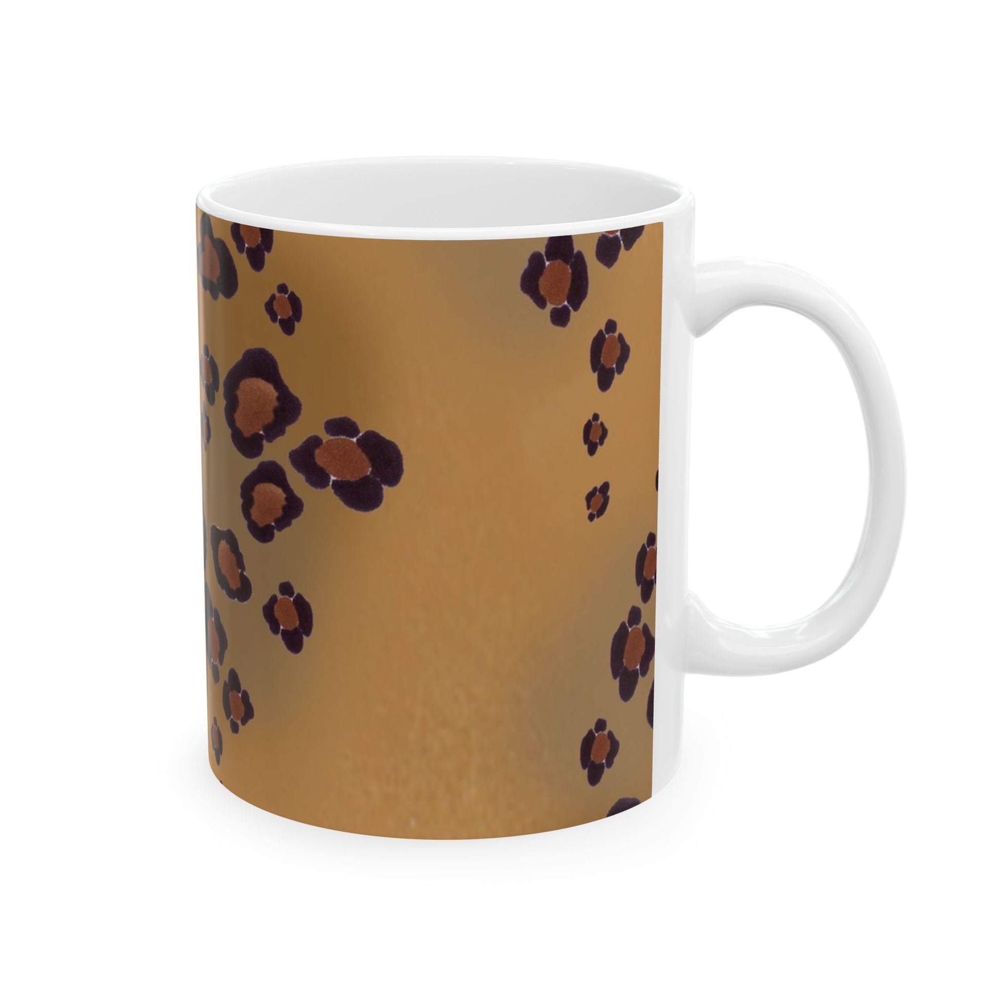 White mug with a brown and dark purple leopard print pattern.