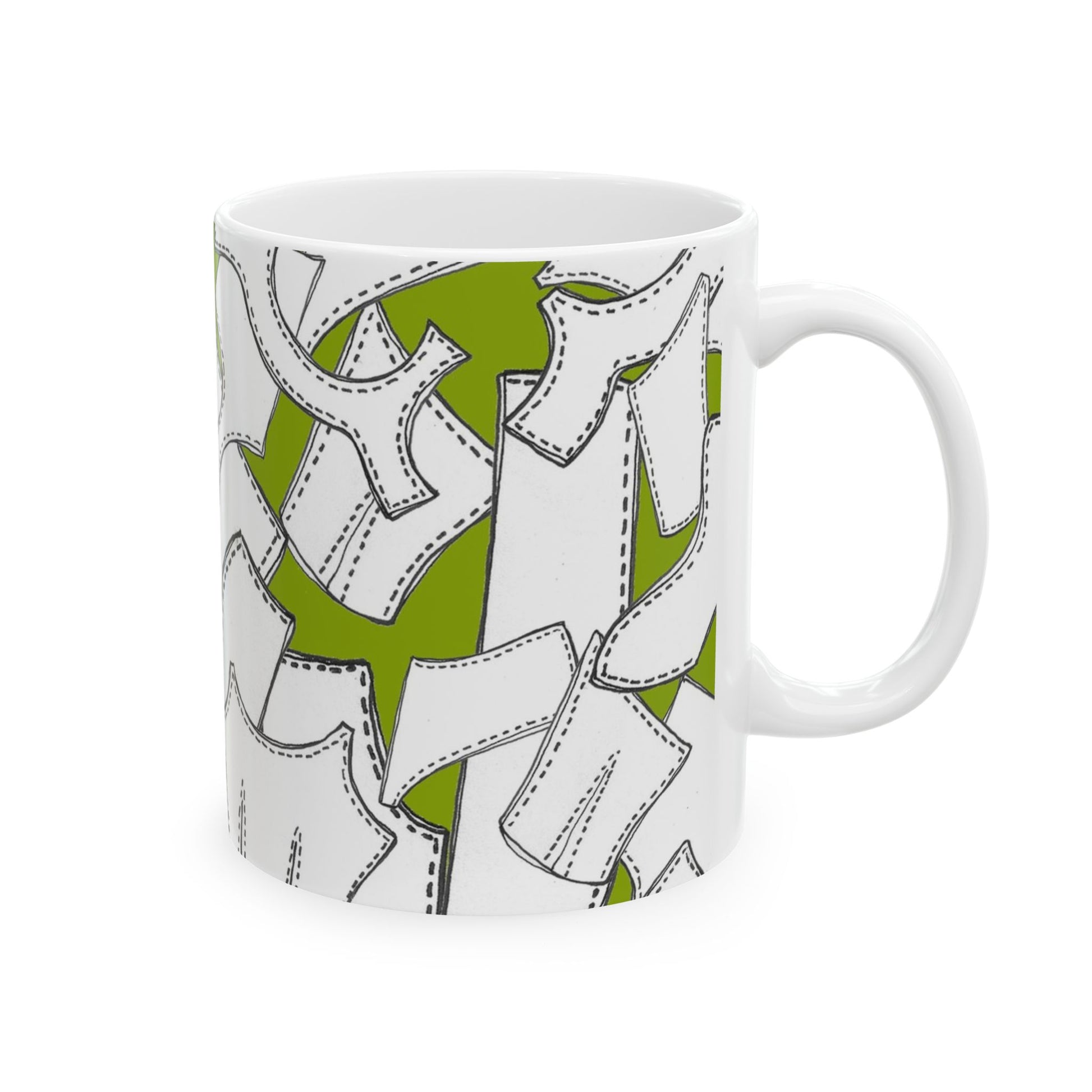 White mug with green background, featuring black outlined shirt patterns.