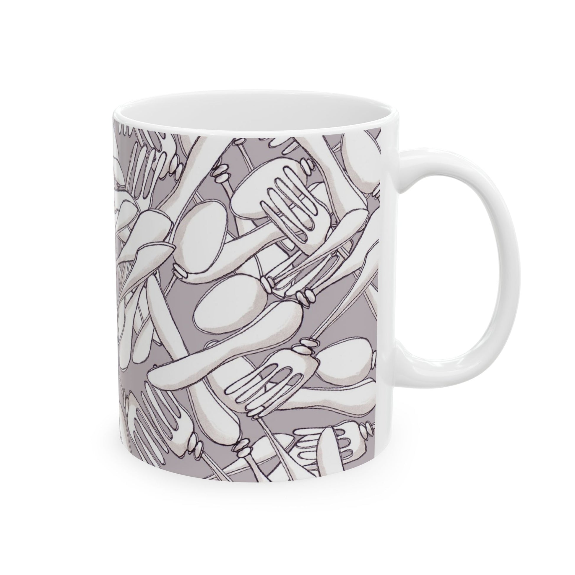 White mug with a gray pattern of overlapping forks, spoons, and knives.