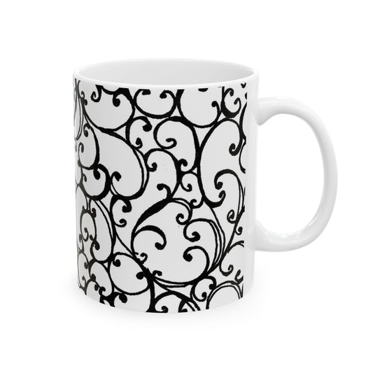 White mug with intricate black swirl patterns covering the surface.